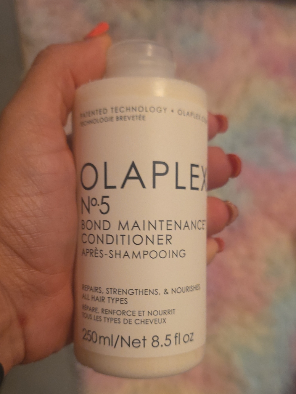 OLAPLEX No.5 Bond Maintenance Conditioner — White bottle with black text